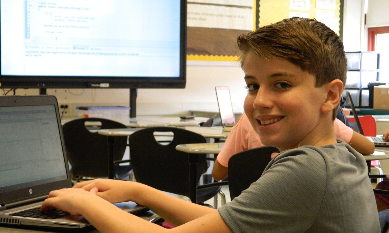Students collaborating at a Steel City Codes hackathon.